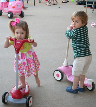 Jameson and Rose riding scooters