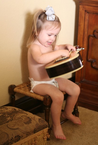 Rose playing the guitar