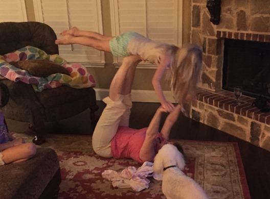 Noelle playing airplane with Mrs. Paula MPP