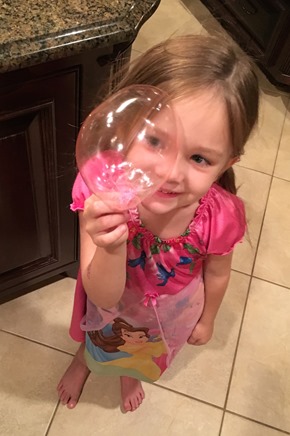 blowing bubbles with Greg and Clarissa